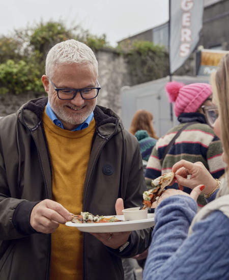 Kilkenny Day Trip Itinerary: 24 Hours - Man and Woman Sharing Food